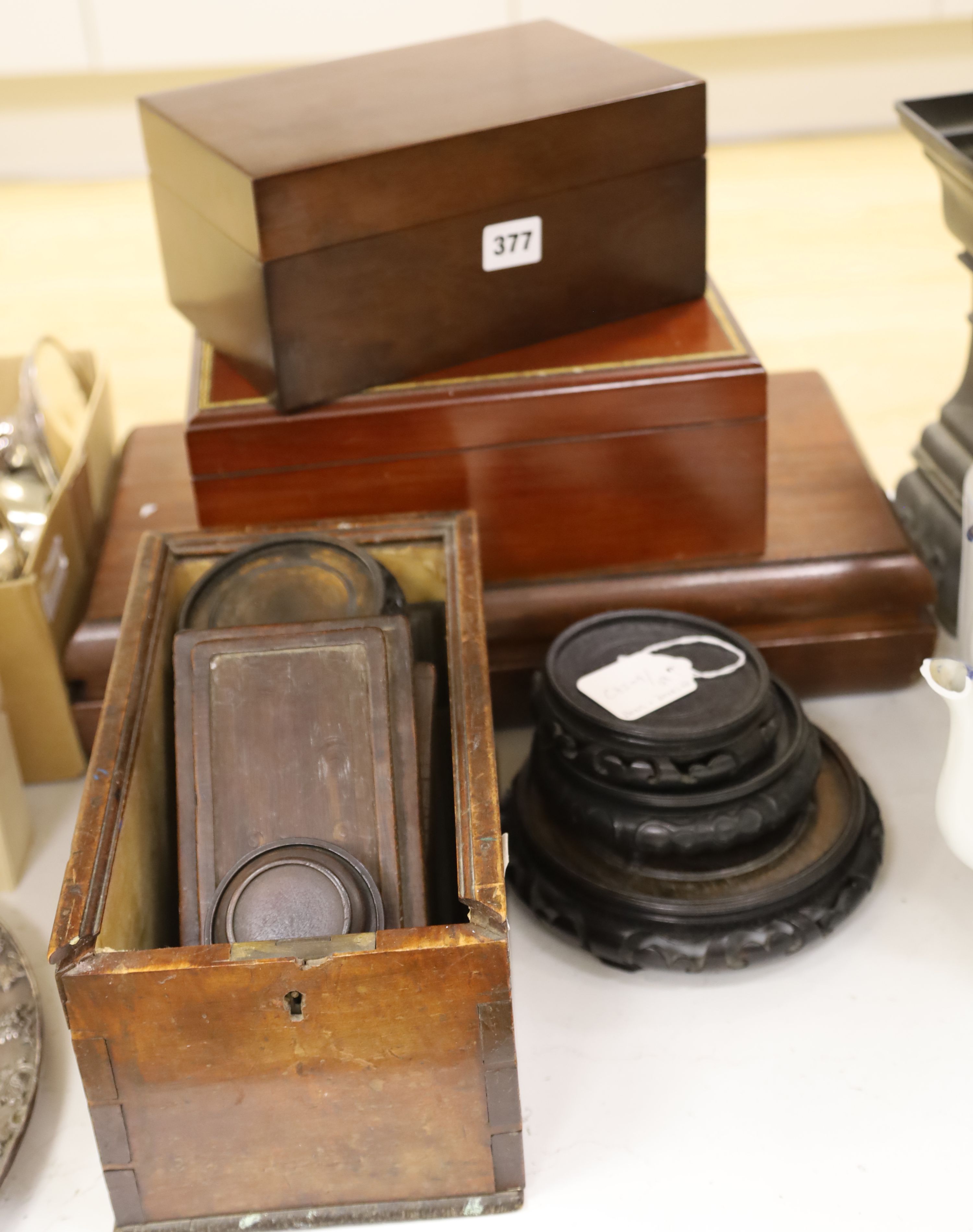 Four violin bows, three wooden humidors, a collection of Chinese wooden stands, etc.